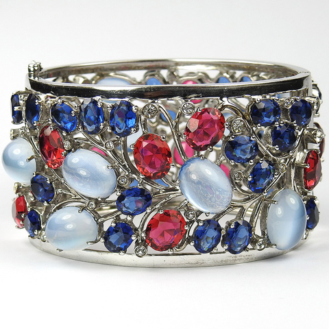 Dujay Sterling Ruby Sapphire and Blue Moonstone Cabochons Openwork Floral Tracery Bangle Bracelet
