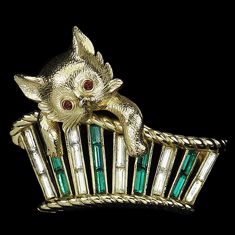 Trifari 'Alfred Philippe' 'Paris in the Spring' Gold and Invisibly Set Diamonds and Emeralds Kitten Climbing out of a Cat Basket Pin